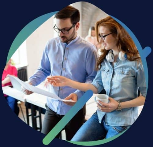 A Couple Examining A Document As Part Of Marketing Services.